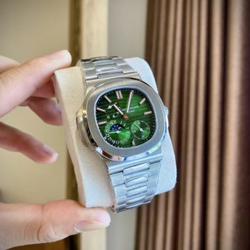 https://dwatchluxury.com/wp-content/uploads/2022/12/Dong-Ho-Patek-Philippe-Nautilus-5712-Replica-11-Mat-Mau-Xanh-La-Cay-767x1024.jpg
